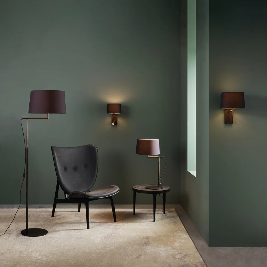 The Telegraph collection includes wall lights, a table and floor light. Shows the collection in a sitting area.