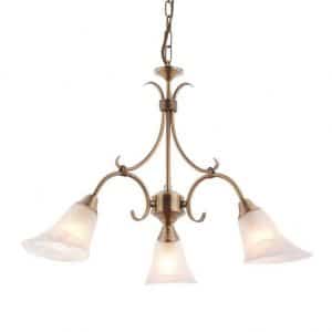 The Hardwick pendant light features elegantly curved arms in antique brass with frosted glass shades encasing 3 lamps.