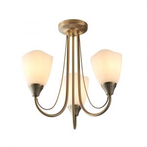 The Haughton ceiling light features 3 arched arms finished in antique brass, complete with opal glass shades.