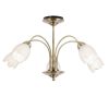 The Petal ceiling light features 5 arching arms in antique brass, complete with frosted glass flower shaped shades.