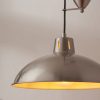 Shows a close up of the Polka pendant light lamp shade. The pendant features a traditional design with a rise and fall suspension system in a nickel plate finish. Height adjustable from a range of 92cm to 198cm.