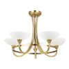 The Cagney ceiling light is a modern take on a classic chandelier in an antique brass finish. The 5 chandelier arms finish in painted glass shades with faint line detailing.