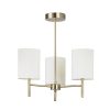 The Brio ceiling light is a modern 3 light chandelier in an antique brass finish complemented by 3 off-white faux silk shades.