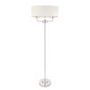 The Nixon floor light features a simple and elegant design with a bright nickel finish and two lamps enclosed in an oval shaped vintage white silk shade. The lamp holders have high quality K9 crystal detailing.