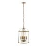 The Lambeth pendant light features a steel framework in an antique brass finish, with clear glass enclosing four lamps.