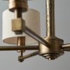 Close up of the Indara pendant light's steel arms in an aged bronze finish.
