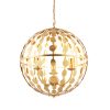 Close up of the Alvah pendant light which features a delicate cage design and decorative circle cut outs enclosing 3 centre lamps. The metalwork comes in a luxuriant gold leaf finish.