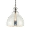 Close up of the Darna pendant light shade when the pendant is on. The light features a vintage design with mottled mercury glass to create a beautiful lighting effect. The base and lamp holder are finished in bright nickel plate.