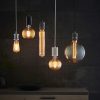Shows various cable set pendants with stylish filament bulbs from the Endon Lighting range against a dark backdrop.