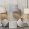 The Mia lampshades shown in several different styles and sizes side by side.