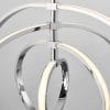 Close up of the Avali pendant light in chrome, showing the integrated LED lights on the exterior of each of the four hoops.