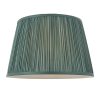 The Freya lampshade features gathered pleated silk in teal with a matching taped edge, pale ivory inner lining, and a reversible gimbal allowing the shade to be used as a table or pendant light.