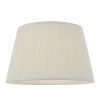 The Freya lampshade features gathered pleated silk in vintage white with a matching taped edge, pale ivory inner lining, and a reversible gimbal allowing the shade to be used as a table or pendant light.