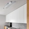 Shows one of the medium version of the Harper ceiling light installed in a contemporary kitchen.