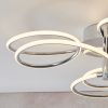 Close up of the Eterne ceiling light's illuminated spiralling arm with chrome plate finish and integrated 32W LED light with white diffuser.