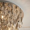 Close up of the top of the Melody ceiling light and the hanging crystal glass beads and teardrops alongside chrome, leaf shaped details enclosing 6 lamps. The recessed base is also finished in chrome.
