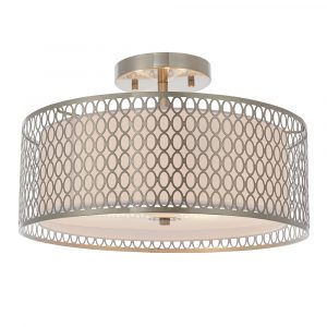The Cordero ceiling light features a satin nickel metal outer shade with a laser cut circle pattern and a white inner fabric shade. The bottom of the inner shade has a frosted glass diffuser enclosing three lamps.