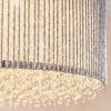 Close up of the Galina pendant light's thousands of high quality crystals housed within twisted polished chrome rods.