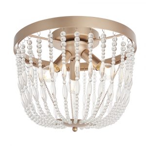 The Celine ceiling light features a rose gold effect finish and clear glass draped bead detailing.