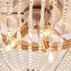 Close up of the Celine ceiling light's lamp holders in rose gold effect finish, enclosed in clear glass draped bead detailing.
