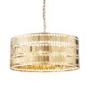 The Eldora pendant light features an ornate design, with hundreds of suspended hexagonal plates in a gold plate finish.