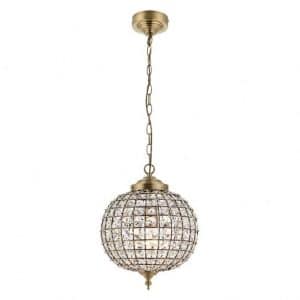 The Tanaro pendant light features a dome-shaped design, constructed of steel and clear glass, with an antique brass finish and beautiful glass bead details.