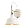 The Laughton wall light is an industrial style light with a gloss stone painted finish in cream with brass effect trim.