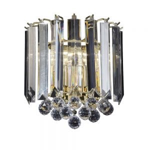 The Fargo wall light has clear acrylic shades and globes supported by a brass effect finished trim.