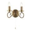 The Trafford wall light has two elegantly curved arms in an antique brass finish with two traditional lampholders and pull cord switch.