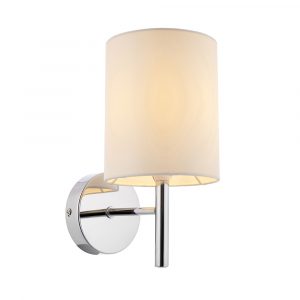 The Brio wall light features a modern design in a chrome finish complemented by an off-white faux silk shade.
