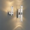 The single and double Essence wall light installed vertically side by side. Shows the pattern of illumination of each fitting.
