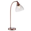 The Hansen table light is an industrial style light in aged copper with ridged lampholder and clear glass shade.